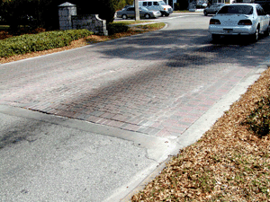 These concrete paver blocks were initially used at an intersection in Belleair, Florida. They have since been reinstalled after a few years due to the formation of ruts, accumulation of grease and cracking.