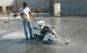 Reducing cracking by cutting control joints in the slab for a new Kash & Karry Store. Tampa, Florida