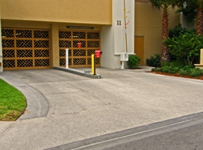 Exposed shell aggregate parking entrance for Sand Pearl Resort in Clearwater