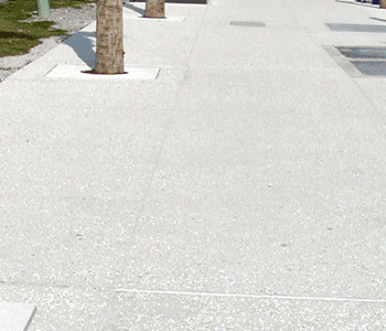 Exposed shell aggregate adds a marine touch to sidewalks on Clearwater Beach, Florida.