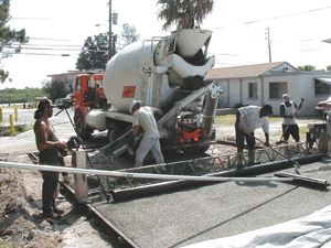 Charger crew installing pervious concrete in Indian Shores, Florida.